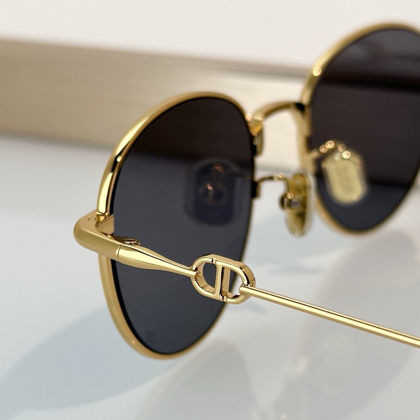 D**R Slim Round Sunglasses with Polished Gold Metal Wire Frame, Dark Grey Solid Lenses & CD Monogram Lens Detail