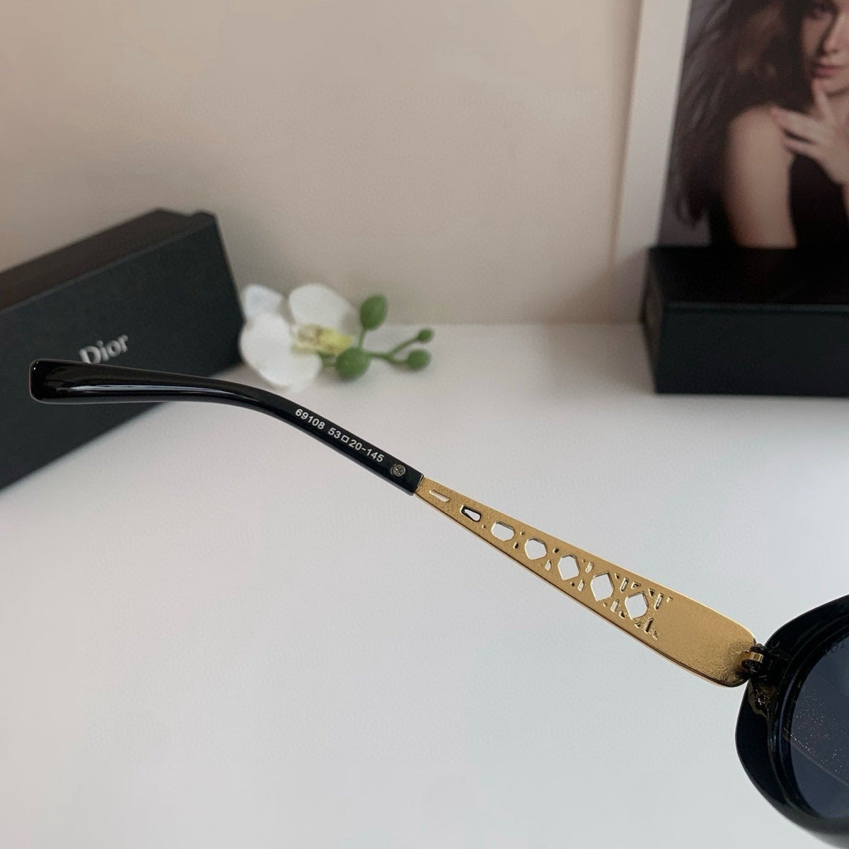 D**R Oval Sunglasses with Glossy Black Acetate Frame, Dark Grey Lenses & Gold Filigree Pearl Embellished Temple Hardware