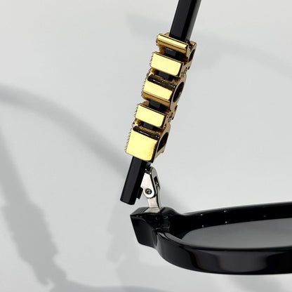 D**R Small Oval Sunglasses | Gloss Black Acetate Frame, Crystal-Set DIOR Letter Temple Block, Gold Metal Nose Bridge, Flat Grey Lenses