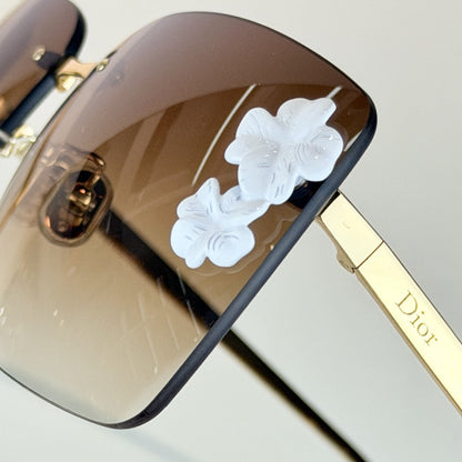 D**R Clover S1U Rimless Sunglasses | Gold Metal Frame, White Floral Detail & Brown Gradient Lenses