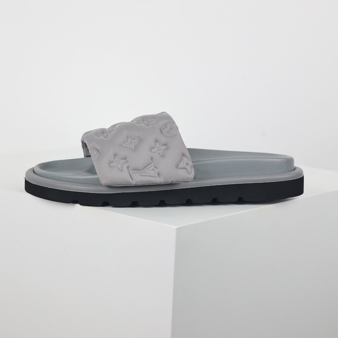 L***V Light Grey Tonal Embossed Monogram Wide Strap Flat Slide Sandals — 2024 Spring Summer Boutique Limited Edition