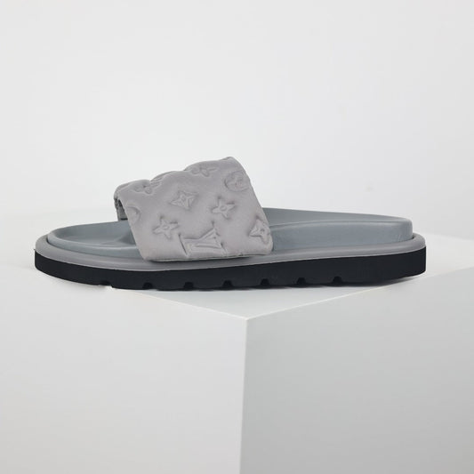 L***V Light Grey Tonal Embossed Monogram Wide Strap Flat Slide Sandals — 2024 Spring Summer Boutique Limited Edition