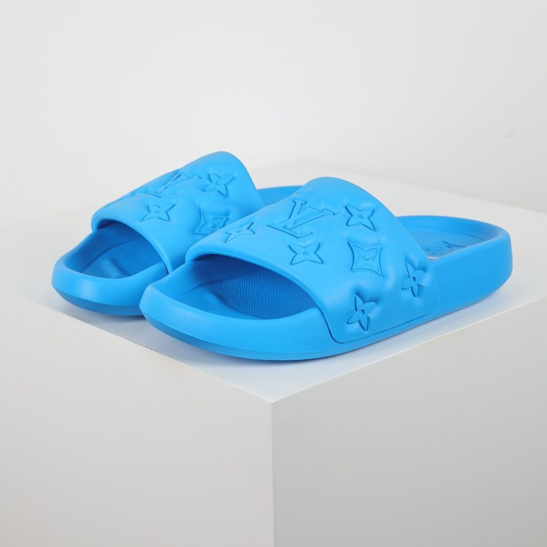 L***V Electric Blue Tonal Monogram Embossed EVA Waterfront Wide Strap Slide Sandals — Spring Summer Boutique Limited Edition