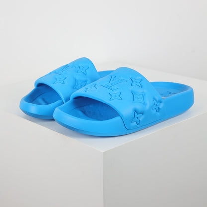 L***V Electric Blue Tonal Monogram Embossed EVA Waterfront Wide Strap Slide Sandals — Spring Summer Boutique Limited Edition