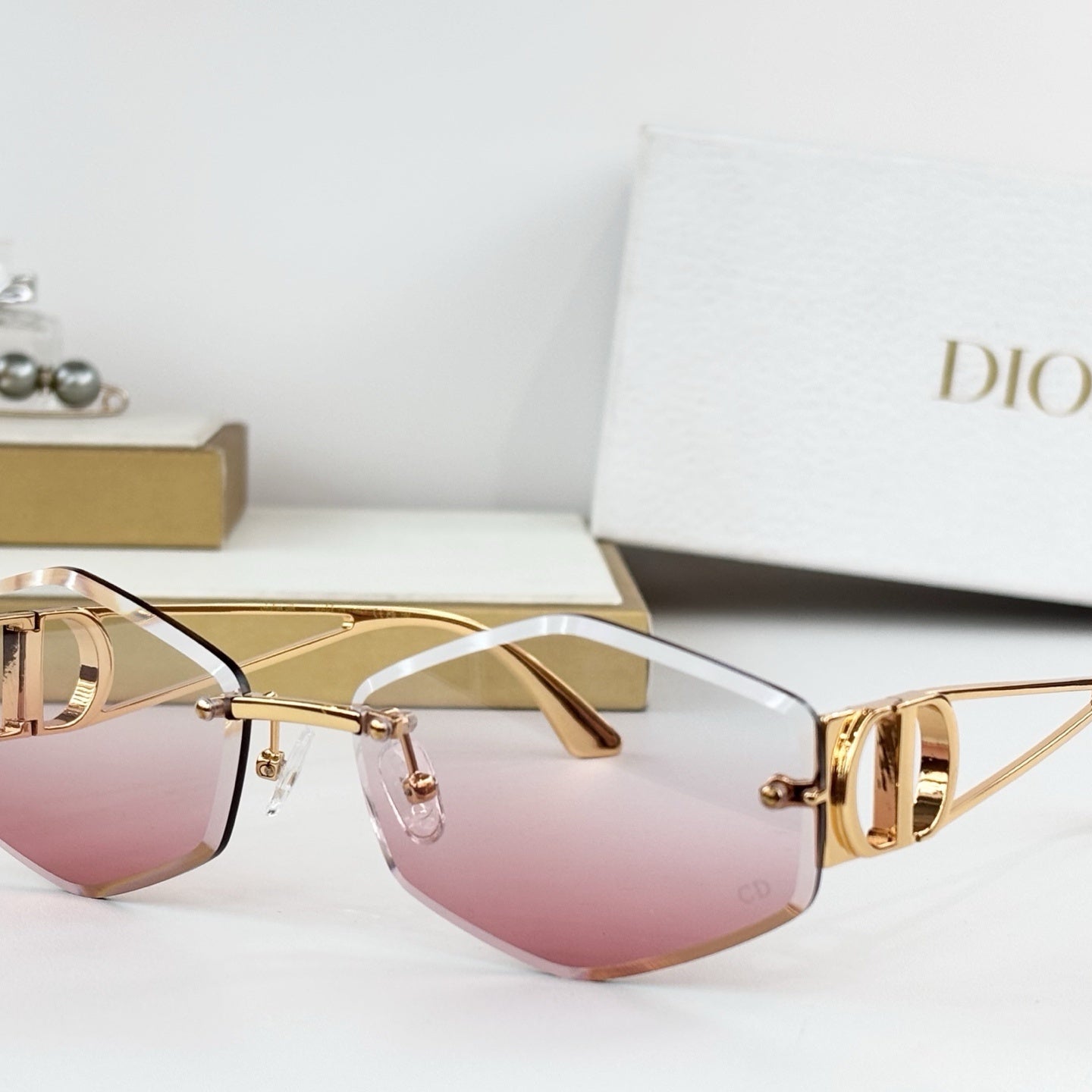 D**R 30Montaigne S6U Rimless Sunglasses | Gold Metal Frame, Brown Gradient Bevelled Lenses, CD Logo Temple | Multiple Colors