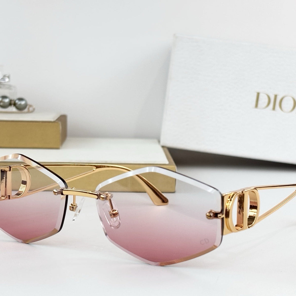 D**R 30Montaigne S6U Rimless Sunglasses | Gold Metal Frame, Brown Gradient Bevelled Lenses, CD Logo Temple | Multiple Colors