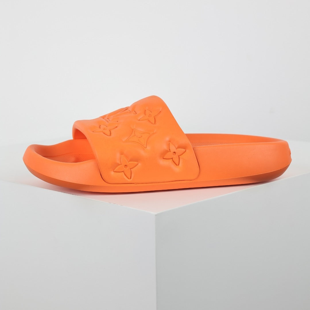 L***V Vivid Orange Tonal Monogram Embossed Waterproof EVA Waterfront Wide Strap Slide Sandals — Spring Summer Boutique Limited Edition