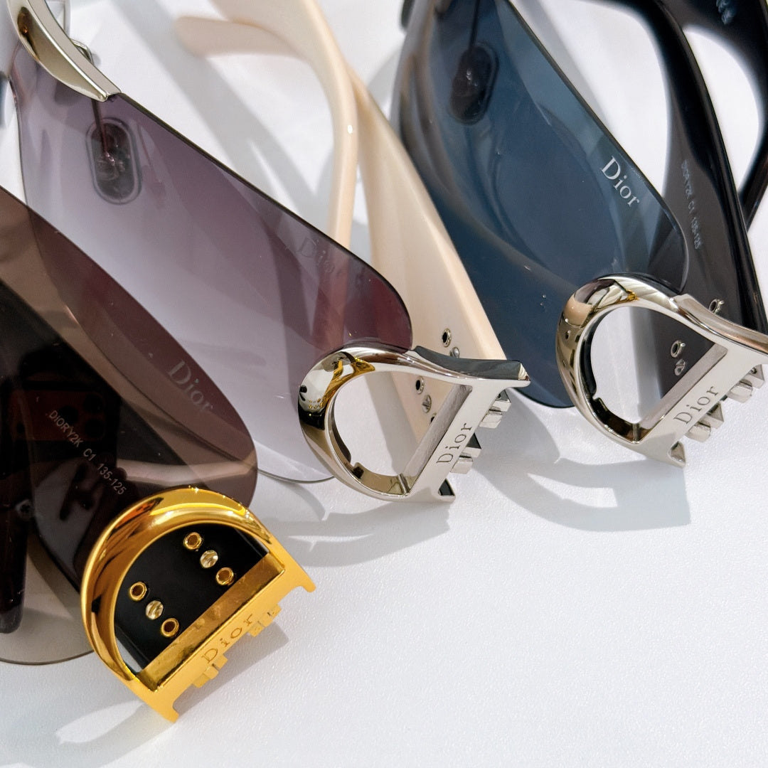 D**R Rimless Wraparound Shield Sunglasses with Grey Purple Gradient Lens, Black Temples & Oversized Gold CD Logo Hardware