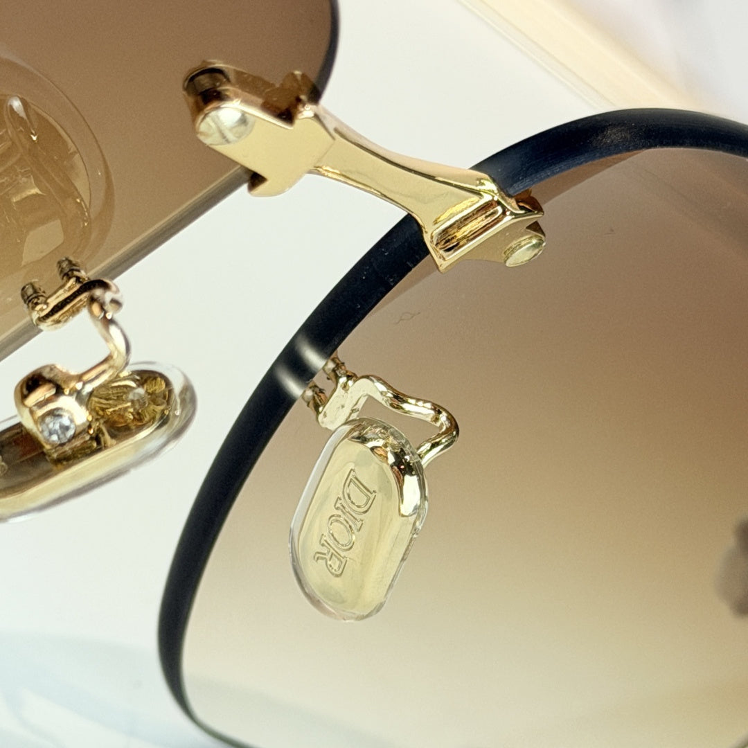 D**R Clover S1U Rimless Sunglasses | Gold Metal Frame, White Floral Detail & Brown Gradient Lenses