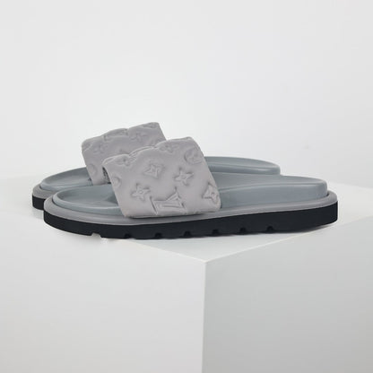 L***V Light Grey Tonal Embossed Monogram Wide Strap Flat Slide Sandals — 2024 Spring Summer Boutique Limited Edition