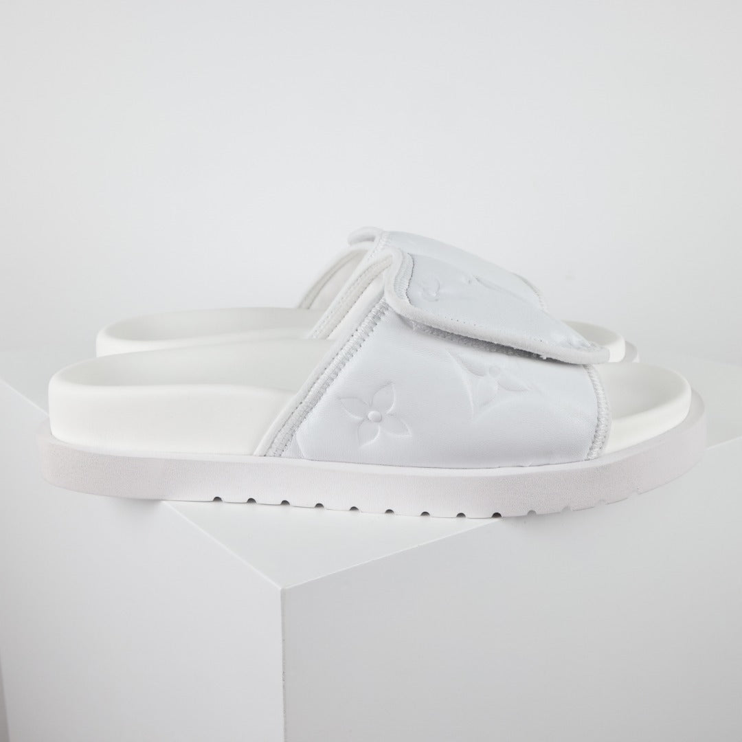 L***V All-White Inflated Pillow Leather Wide Strap Miami Slide Sandals — Spring Summer Boutique Limited Edition