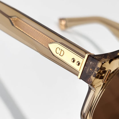D**R Oversized Square Acetate Sunglasses | Transparent Champagne Frame, Gold CD Rivet, Gold Metal Tip, Flat Brown Lenses