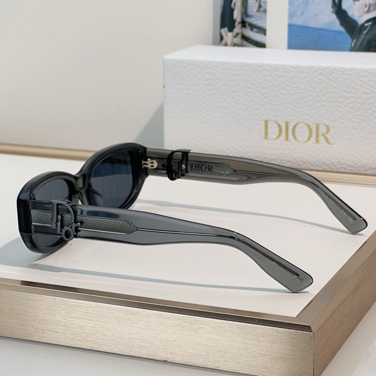 D**R Slim Oval Sunglasses with Smoky Transparent Grey Frame, CD Oblique Monogram Print Lenses & Gunmetal Hardware