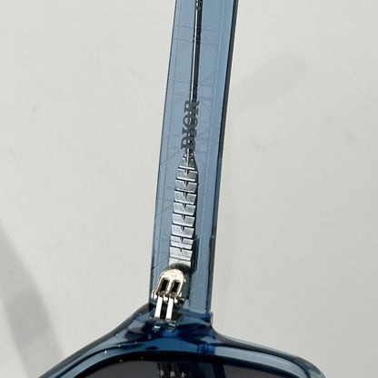 D**R Square Sunglasses | Ice Blue Transparent Frame, Dark Grey Lenses & Black CD Logo Hinge