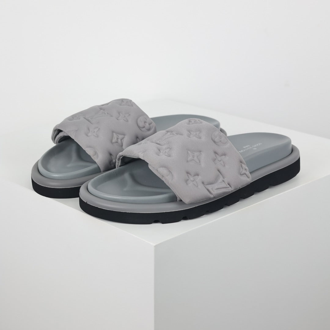 L***V Light Grey Tonal Embossed Monogram Wide Strap Flat Slide Sandals — 2024 Spring Summer Boutique Limited Edition