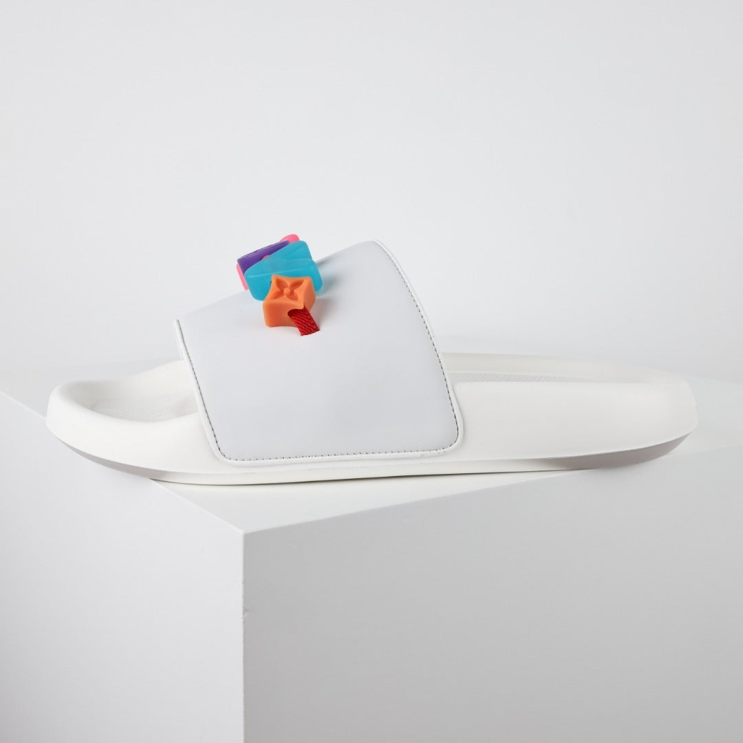 L***V Rubber Pool Slide Sandals — SS23 Limited Edition 3D Logo Charm Slip-On Beach Slippers (White)