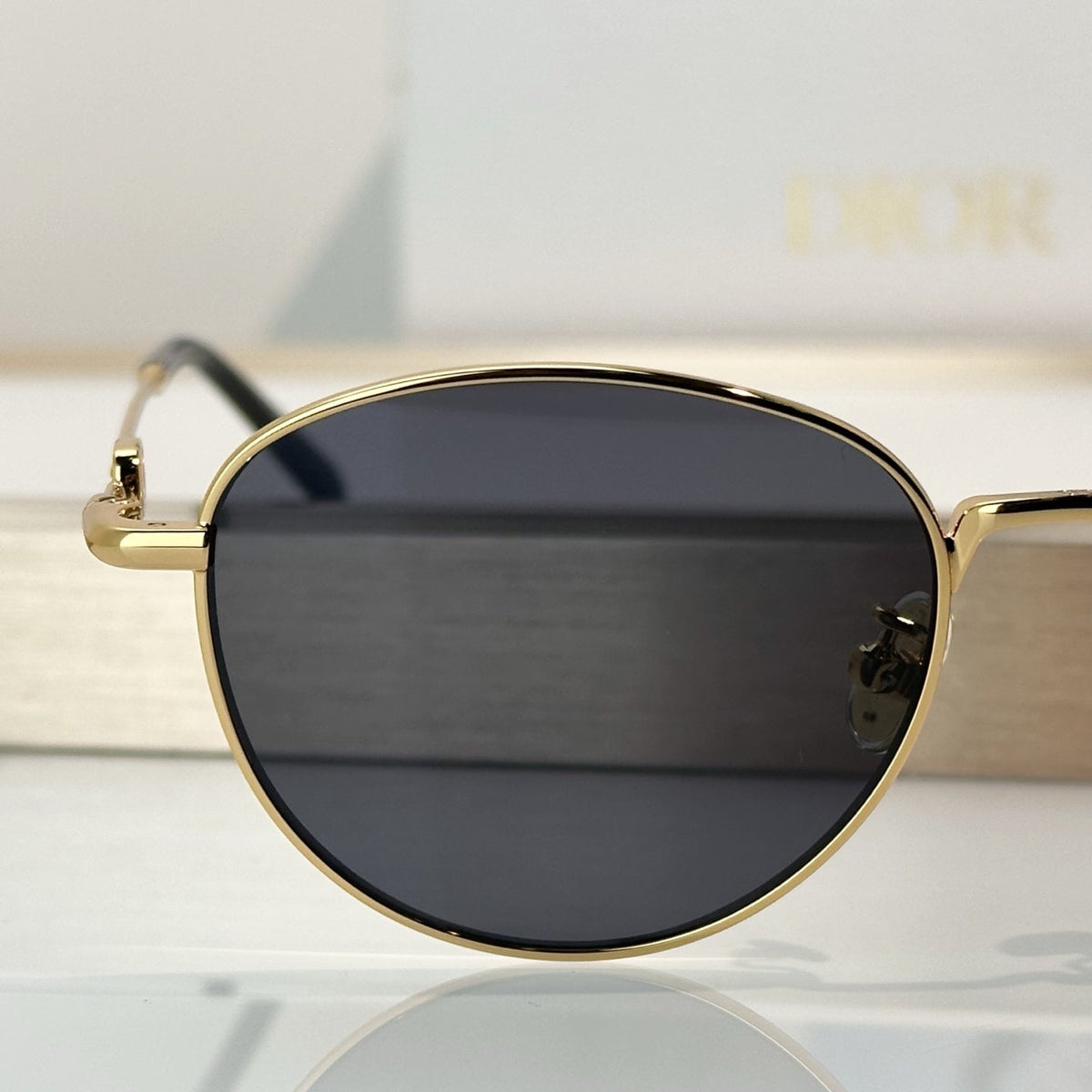 D**R Slim Round Sunglasses with Polished Gold Metal Wire Frame, Dark Grey Solid Lenses & CD Monogram Lens Detail