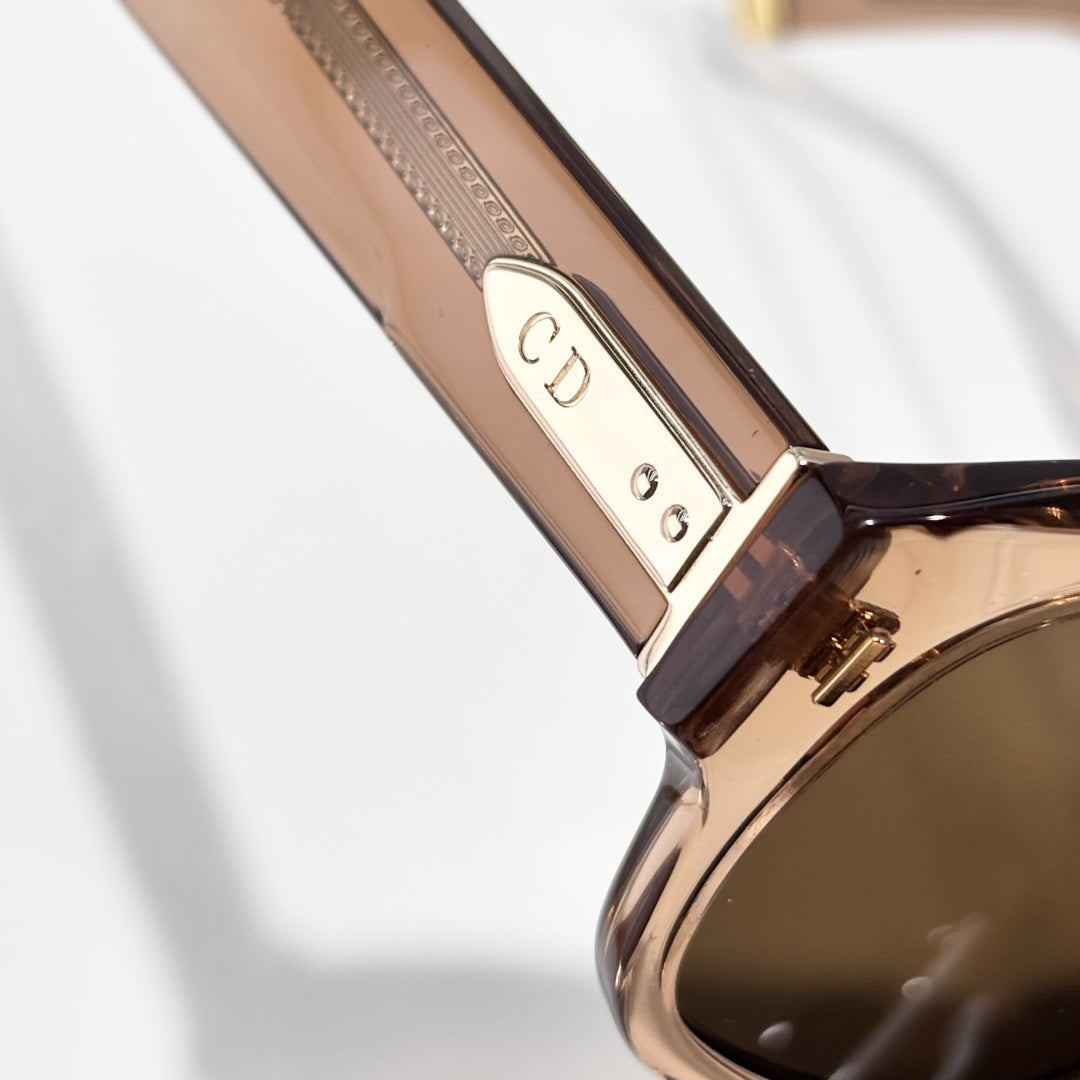 D**R Bold Square Acetate Sunglasses | Transparent Champagne-Brown Frame, Gold CD Metal Inlay, Three-Rivet Temple, Flat Brown Lenses