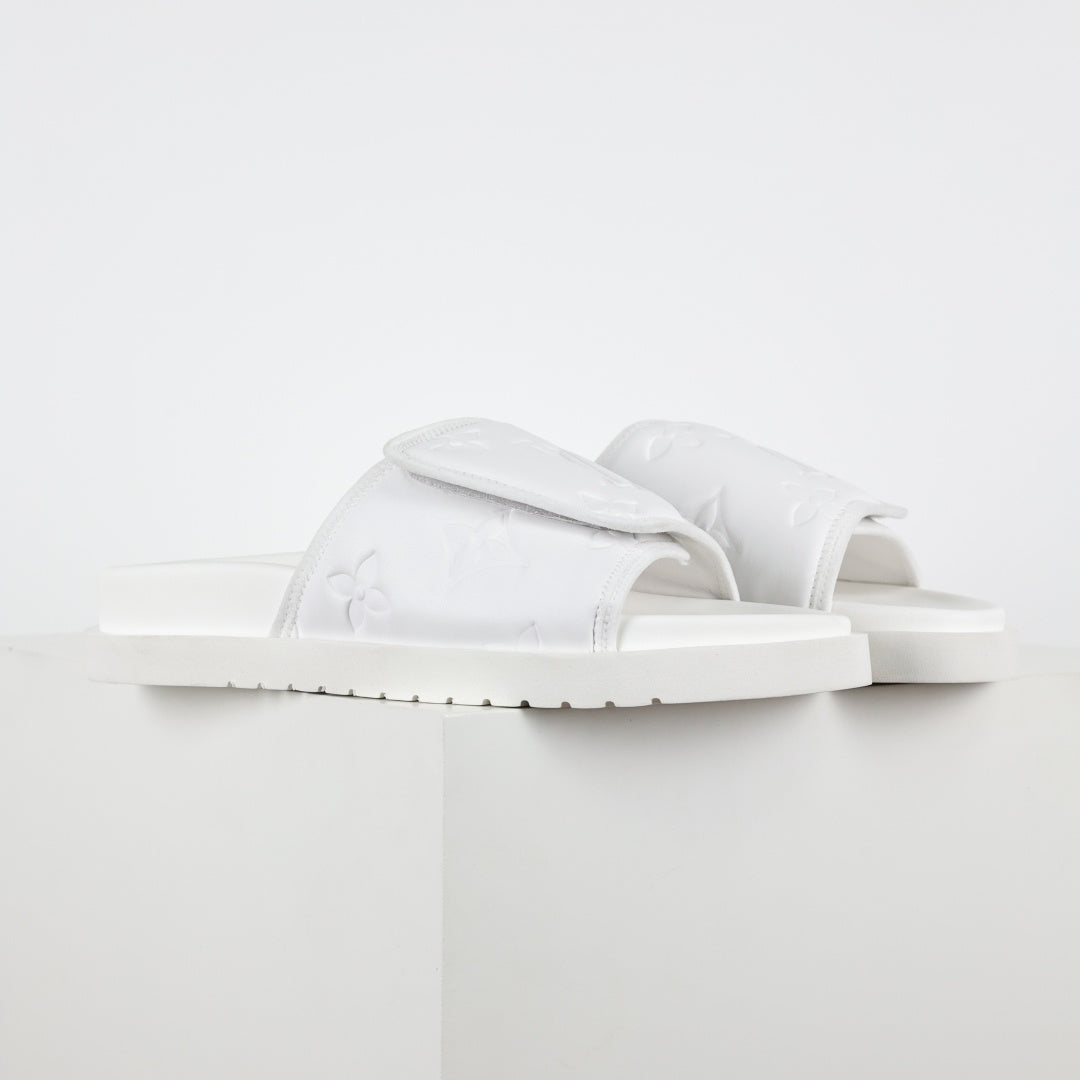 L***V Ivory White Inflated Pillow Leather Twisted Bow Ruched Strap Miami Slide Sandals — Spring Summer Boutique Limited Edition