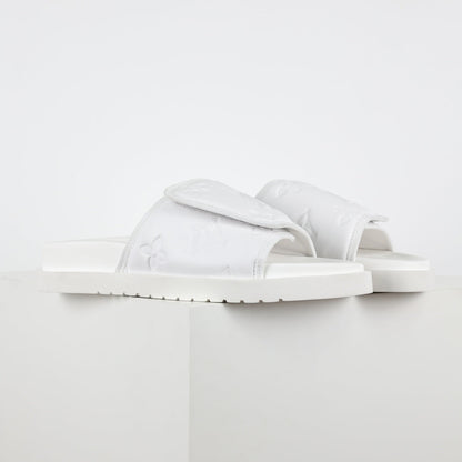 L***V Ivory White Inflated Pillow Leather Twisted Bow Ruched Strap Miami Slide Sandals — Spring Summer Boutique Limited Edition