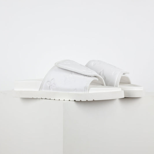 L***V Ivory White Inflated Pillow Leather Twisted Bow Ruched Strap Miami Slide Sandals — Spring Summer Boutique Limited Edition