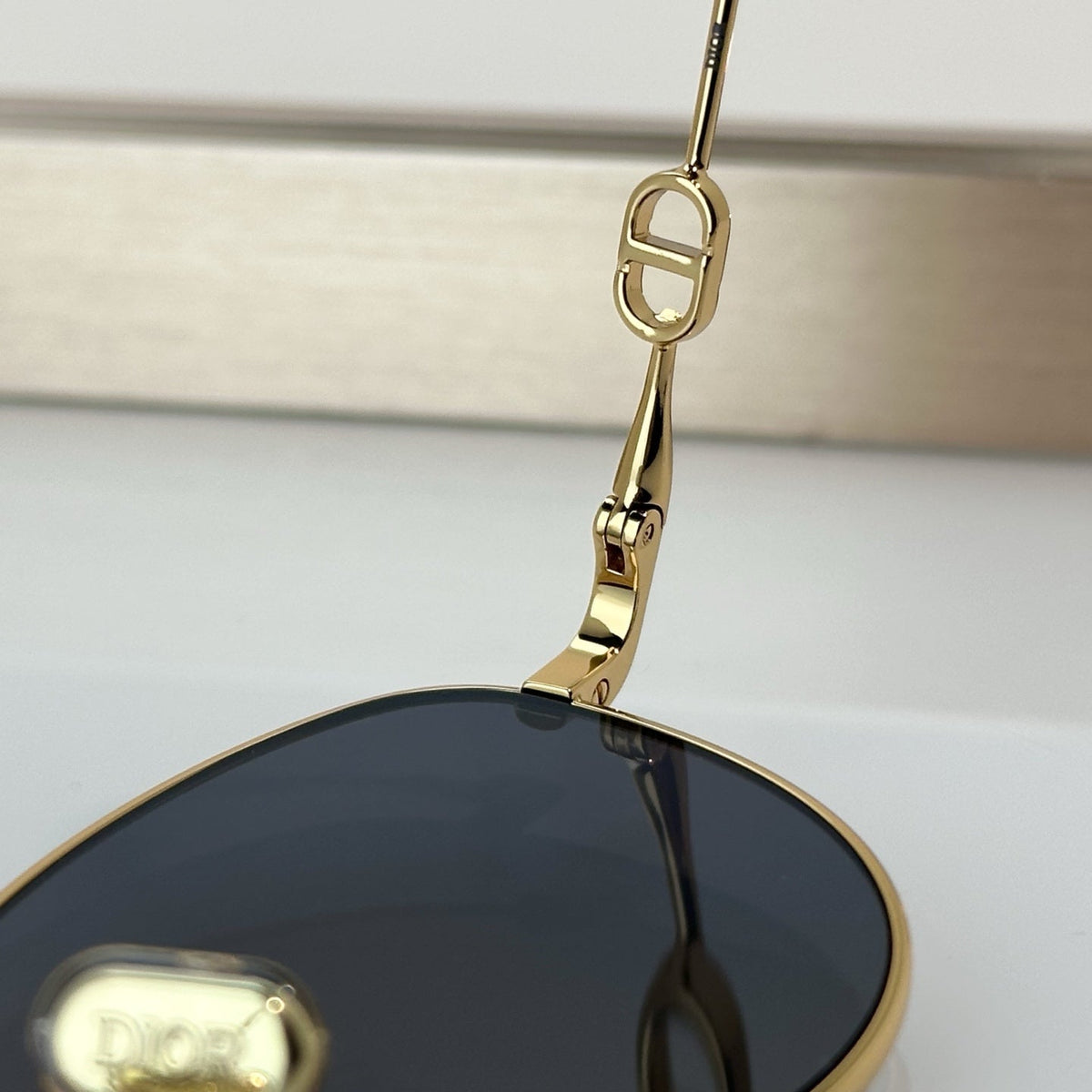 D**R Slim Round Sunglasses with Polished Gold Metal Wire Frame, Dark Grey Solid Lenses & CD Monogram Lens Detail