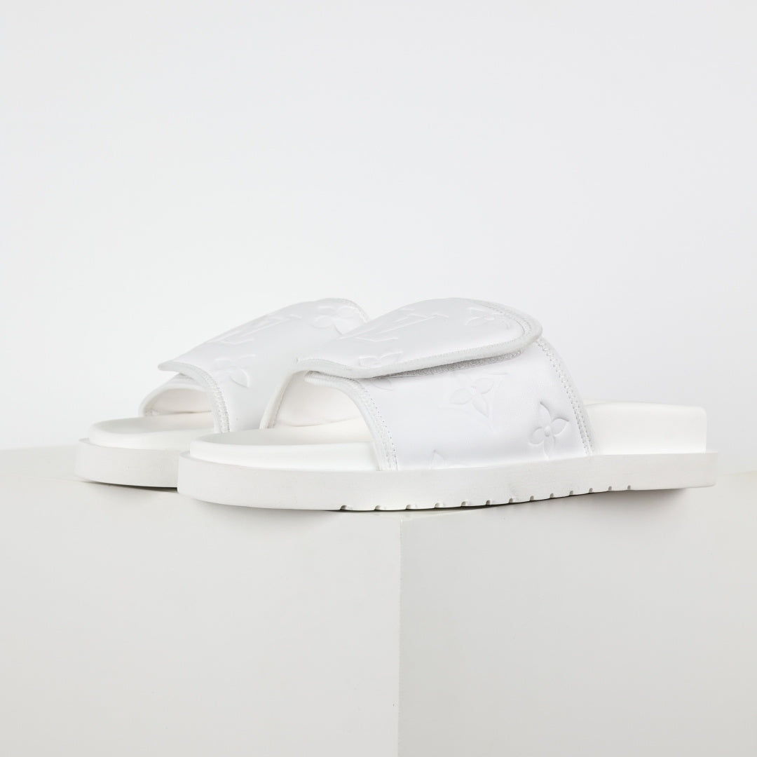L***V Ivory White Inflated Pillow Leather Twisted Bow Ruched Strap Miami Slide Sandals — Spring Summer Boutique Limited Edition