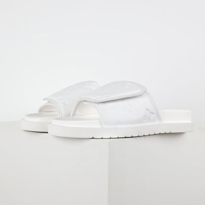 L***V Ivory White Inflated Pillow Leather Twisted Bow Ruched Strap Miami Slide Sandals — Spring Summer Boutique Limited Edition
