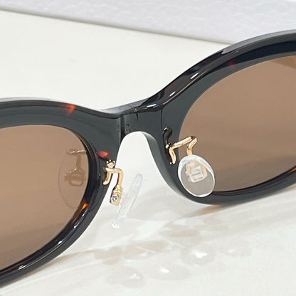 D**R Slim Oval Sunglasses with Clear Transparent Acetate Frame, Forest Green Lenses & Gold Logo Hardware