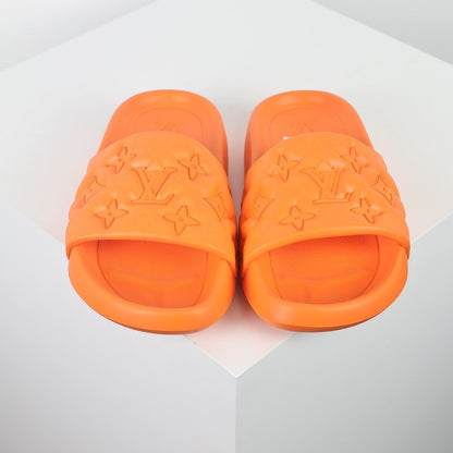 L***V Vivid Orange Tonal Monogram Embossed Waterproof EVA Waterfront Wide Strap Slide Sandals — Spring Summer Boutique Limited Edition