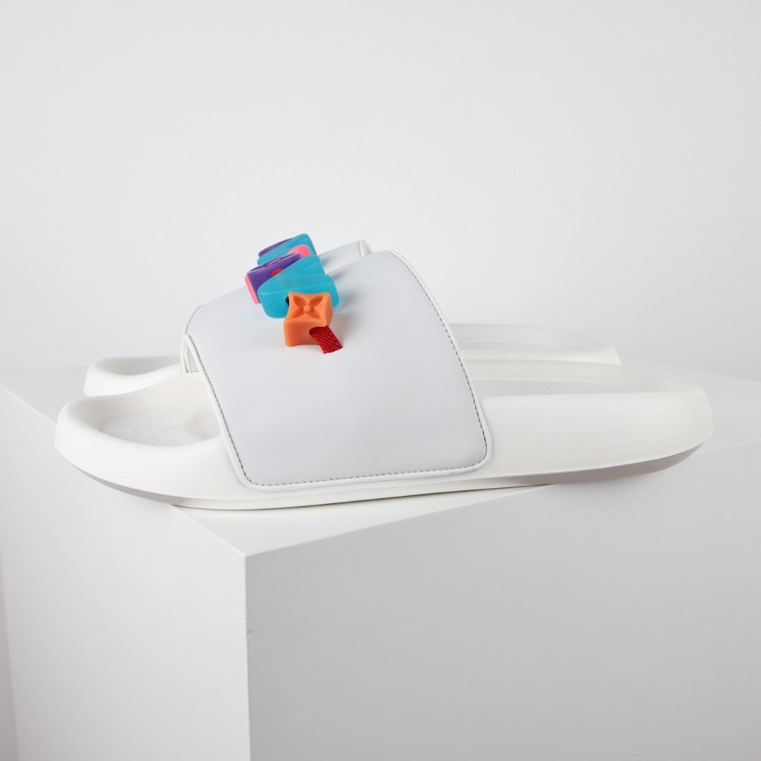 L***V Rubber Pool Slide Sandals — SS23 Limited Edition 3D Logo Charm Slip-On Beach Slippers (White)