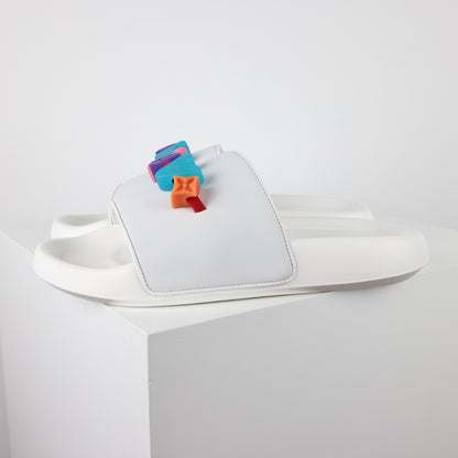 L***V Rubber Pool Slide Sandals — SS23 Limited Edition 3D Logo Charm Slip-On Beach Slippers (White)