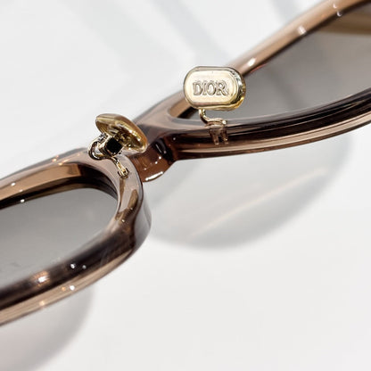 D**R Bold Square Acetate Sunglasses | Transparent Champagne-Brown Frame, Gold CD Metal Inlay, Three-Rivet Temple, Flat Brown Lenses