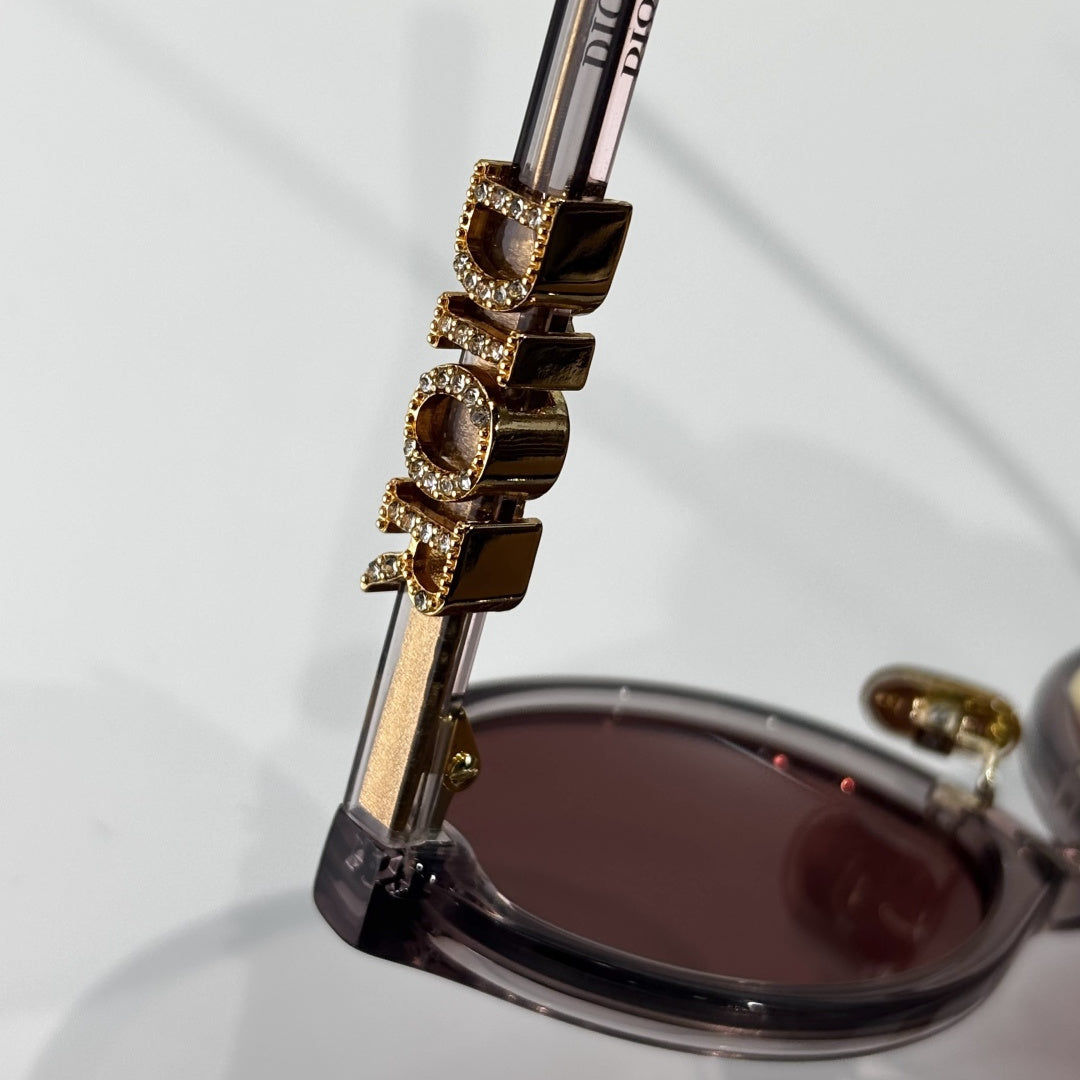 D**R Small Round Oval Sunglasses | Gloss Black Acetate, Crystal-Set DIOR Letter Temple Block, Gold Metal Nose Bridge, Flat Dark Grey Lenses