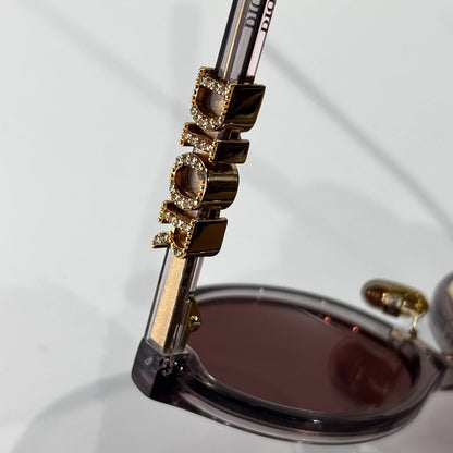D**R Small Round Oval Sunglasses | Gloss Black Acetate, Crystal-Set DIOR Letter Temple Block, Gold Metal Nose Bridge, Flat Dark Grey Lenses