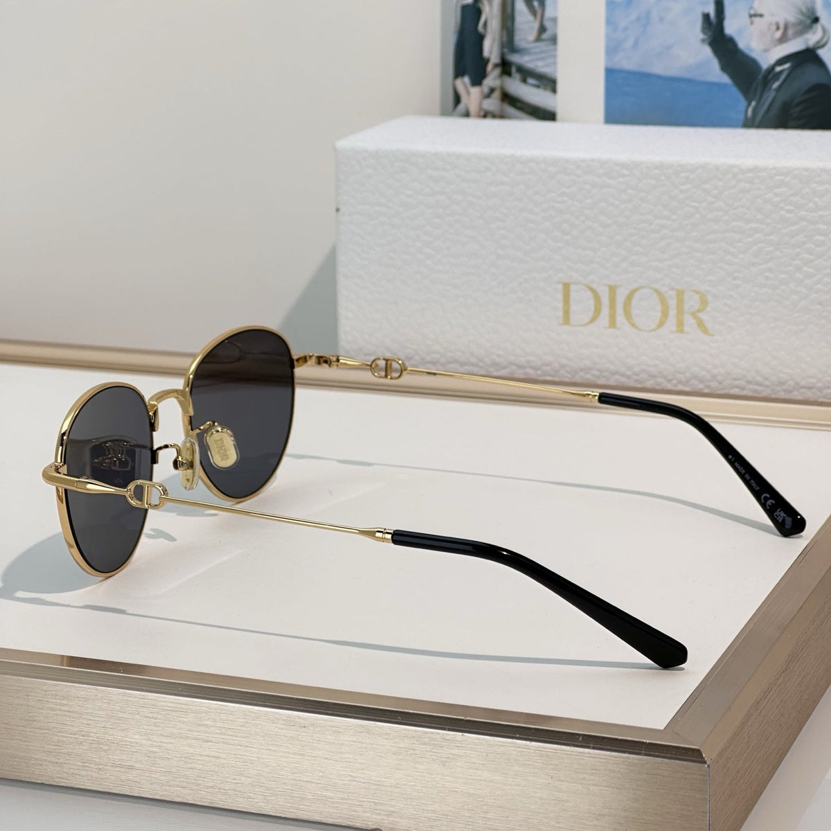 D**R Slim Round Sunglasses with Polished Gold Metal Wire Frame, Dark Grey Solid Lenses & CD Monogram Lens Detail