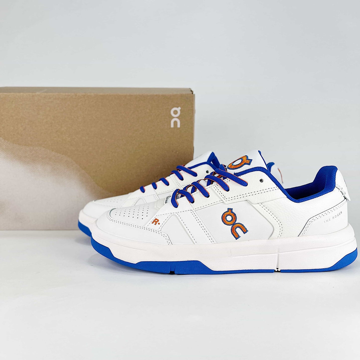 On THE ROGER CH Varsity – White & Royal Blue Unisex Premium Tennis-Inspired Lifestyle Sneakers