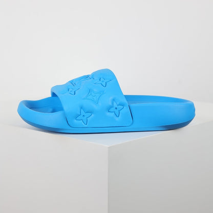 L***V Electric Blue Tonal Monogram Embossed EVA Waterfront Wide Strap Slide Sandals — Spring Summer Boutique Limited Edition