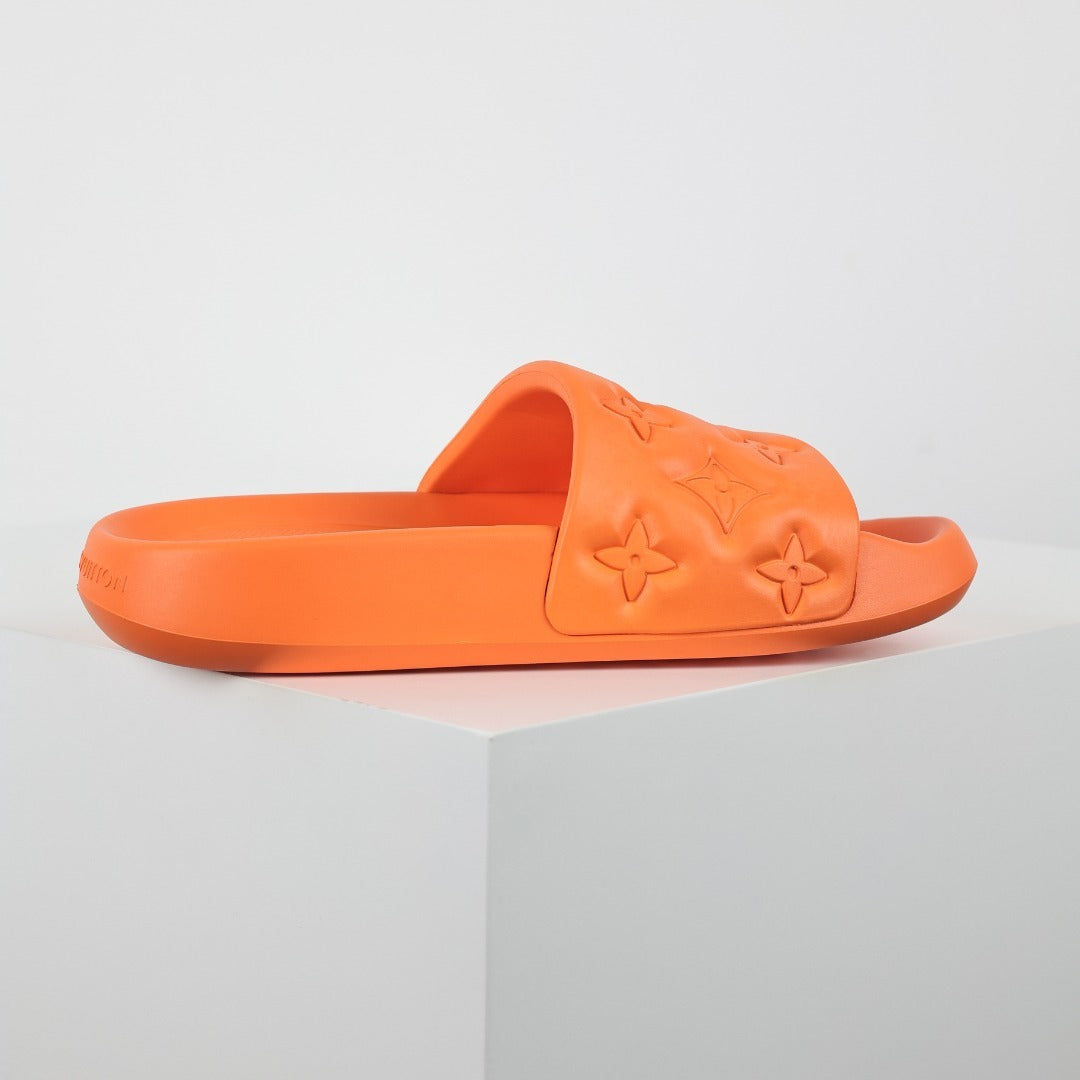 L***V Vivid Orange Tonal Monogram Embossed Waterproof EVA Waterfront Wide Strap Slide Sandals — Spring Summer Boutique Limited Edition