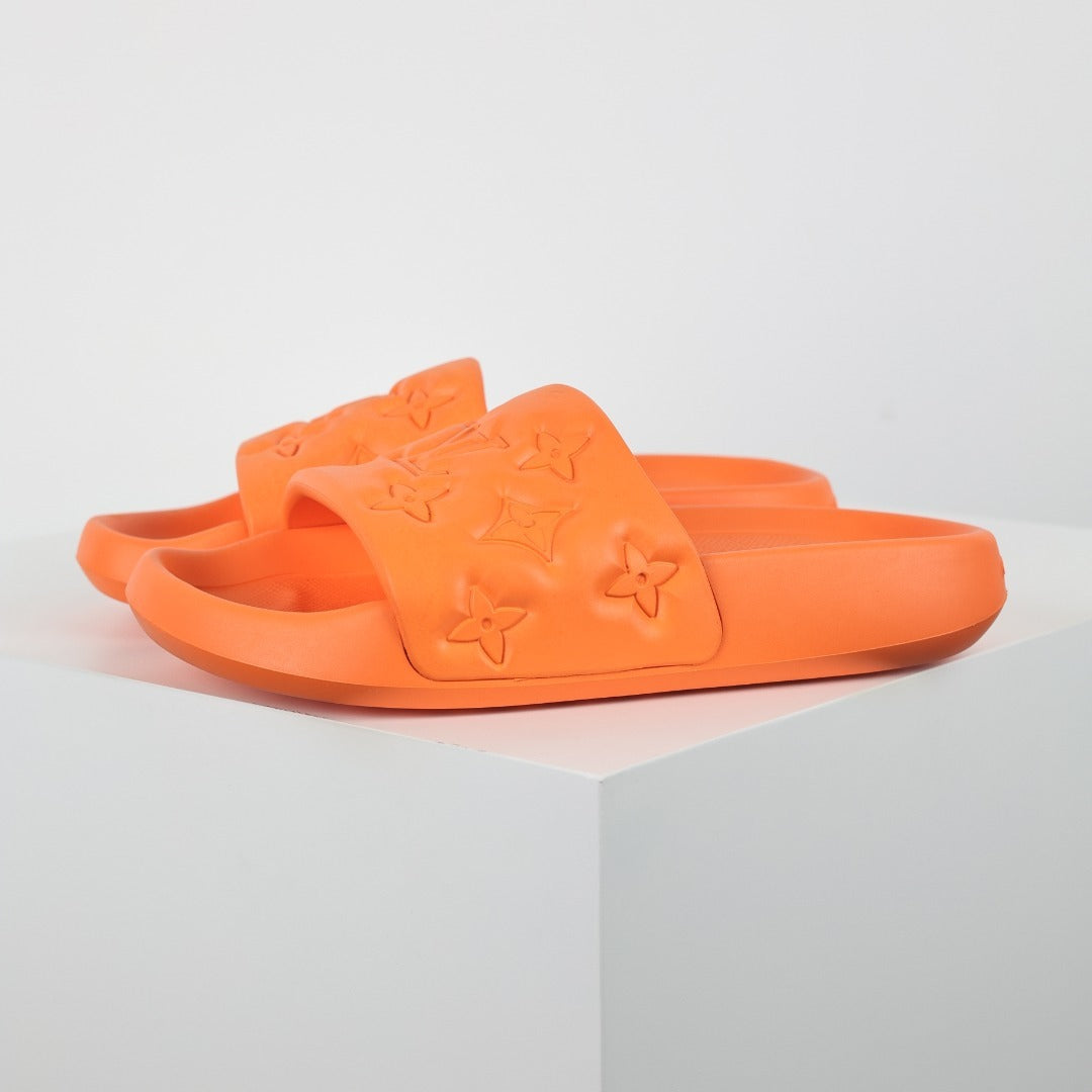 L***V Vivid Orange Tonal Monogram Embossed Waterproof EVA Waterfront Wide Strap Slide Sandals — Spring Summer Boutique Limited Edition
