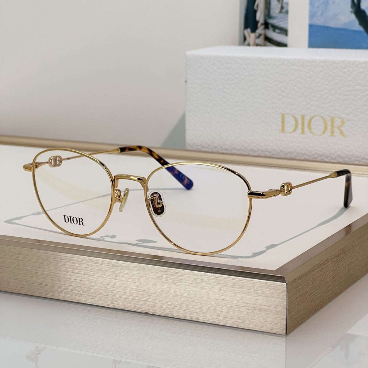 D**R Round Optical Glasses with Slim Rose Gold Metal Wire Frame, Clear Blue Light Lenses & 3D CD Logo Hardware