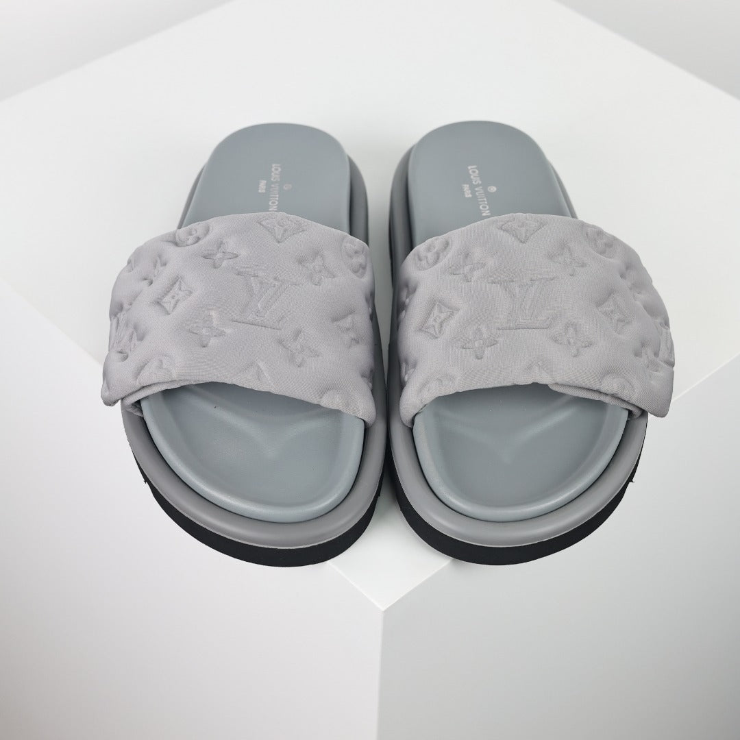 L***V Light Grey Tonal Embossed Monogram Wide Strap Flat Slide Sandals — 2024 Spring Summer Boutique Limited Edition