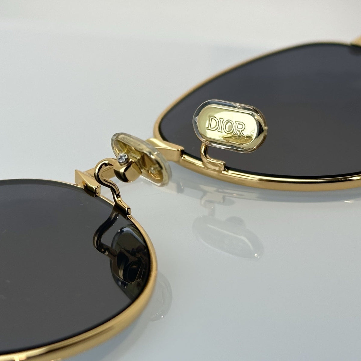 D**R Slim Round Sunglasses with Polished Gold Metal Wire Frame, Dark Grey Solid Lenses & CD Monogram Lens Detail