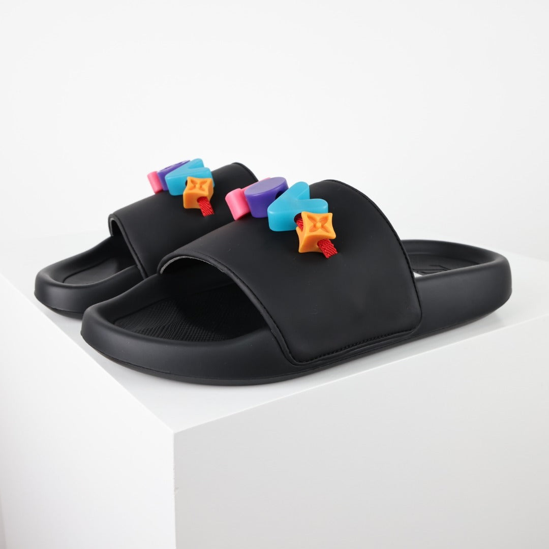 L***V Rubber Pool Slide Sandals — SS23 Limited Edition 3D Logo Charm Slip-On Beach Slippers (Black)