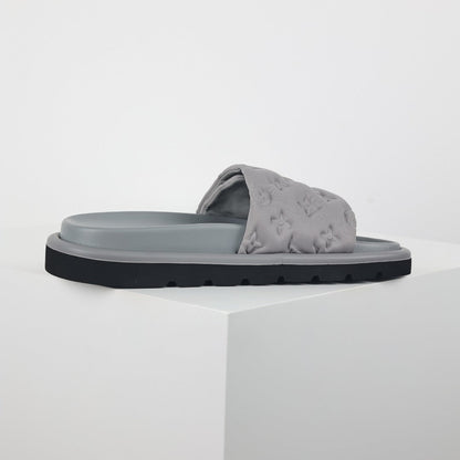 L***V Light Grey Tonal Embossed Monogram Wide Strap Flat Slide Sandals — 2024 Spring Summer Boutique Limited Edition