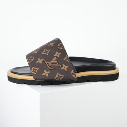 L***V Monogram Canvas LV Logo Slide Sandals — SS24 Gold Hardware Wide Band Slip-On Pool Beach Slippers (4 Colors)
