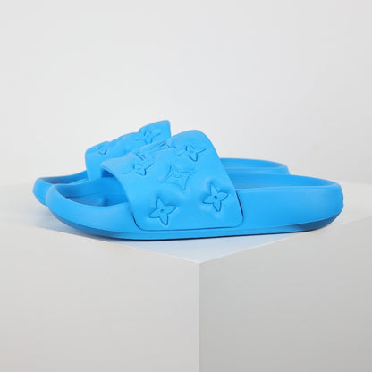 L***V Electric Blue Tonal Monogram Embossed EVA Waterfront Wide Strap Slide Sandals — Spring Summer Boutique Limited Edition