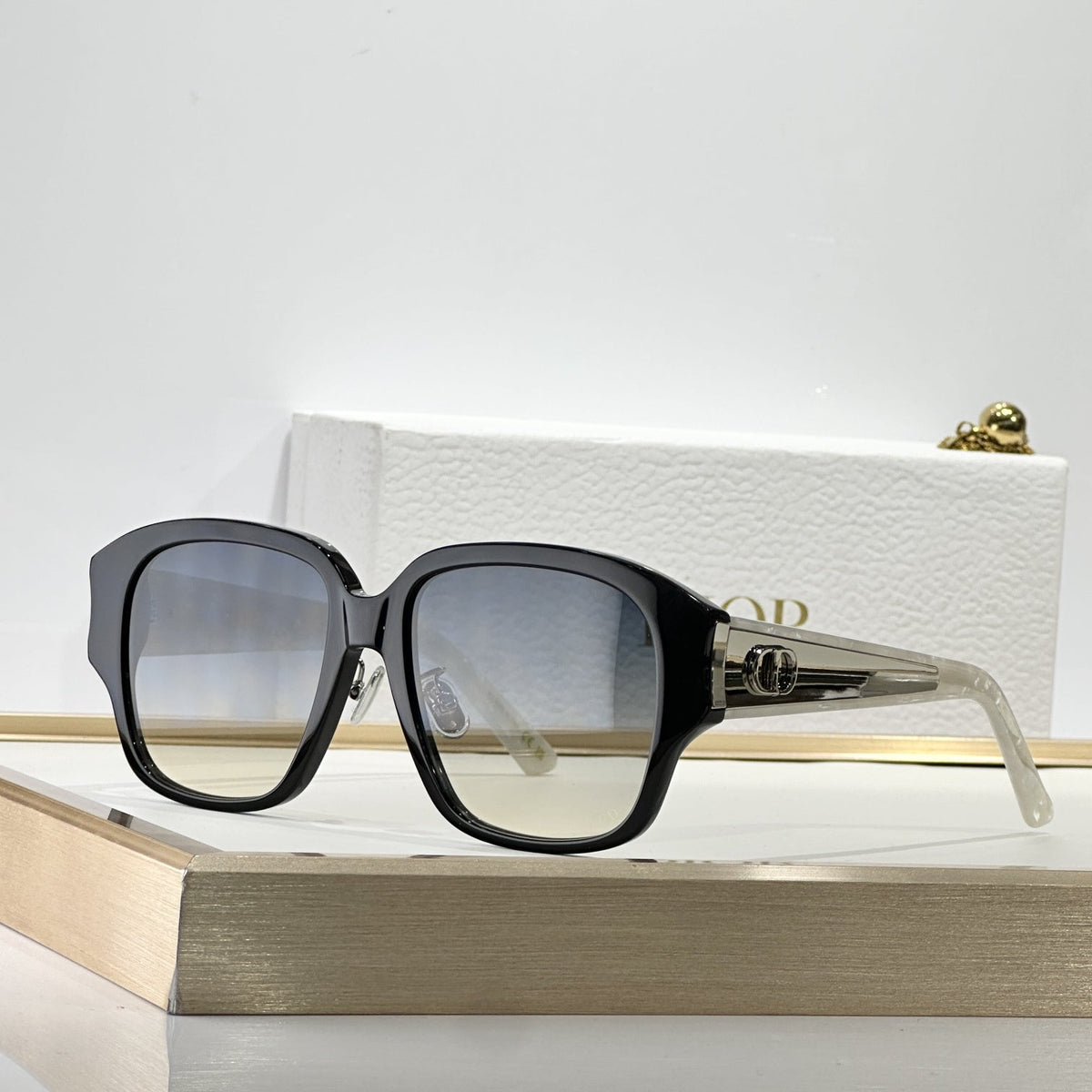D**R Oversized Square Sunglasses | Glossy Black Frame, Dark Grey Lenses & Gold CD Logo Inlay Temple | 6 Colorways