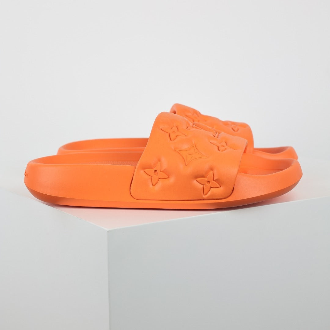 L***V Vivid Orange Tonal Monogram Embossed Waterproof EVA Waterfront Wide Strap Slide Sandals — Spring Summer Boutique Limited Edition