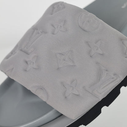 L***V Light Grey Tonal Embossed Monogram Wide Strap Flat Slide Sandals — 2024 Spring Summer Boutique Limited Edition